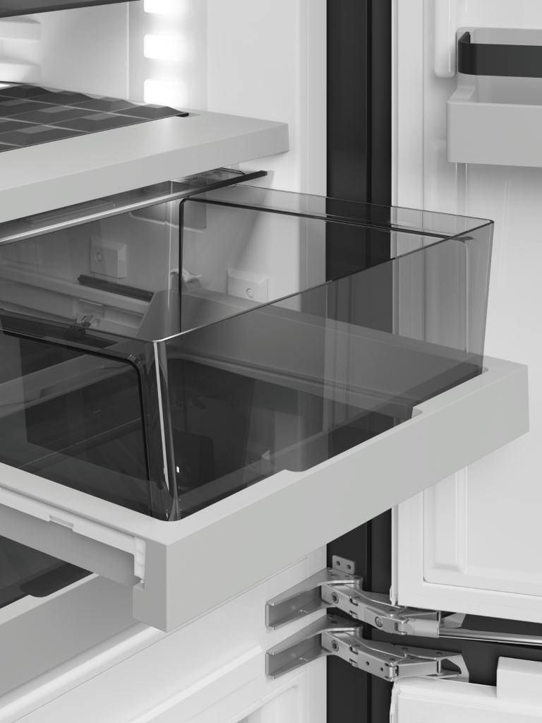 Close-up view of a premium refrigerator interior showing transparent storage drawers and sleek LED lighting for organised cooling