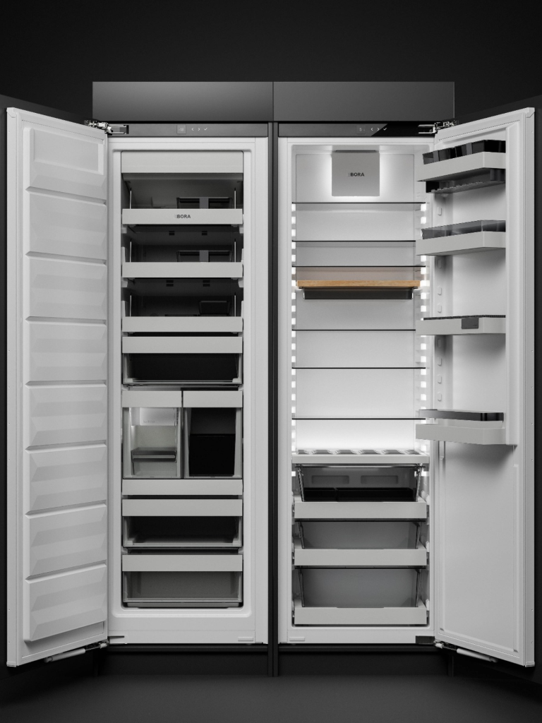 Open Bora refrigeration system showing dual integrated fridge and freezer units with adjustable shelving and premium interior lighting